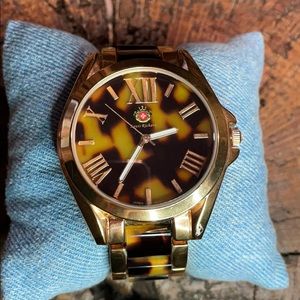 Louis Richard women’s tortoise and gold watch